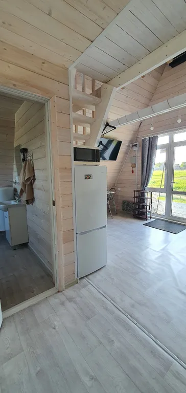 Тpеугольный дом A-frаmе с видом на море