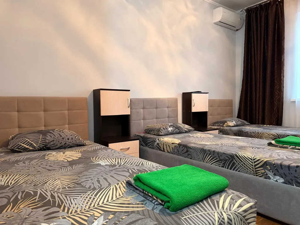 Четырехместный номер с 4-мя односпальными кроватями