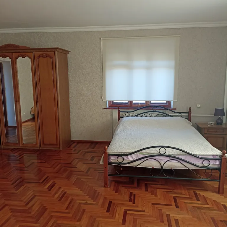 Дом с балконом