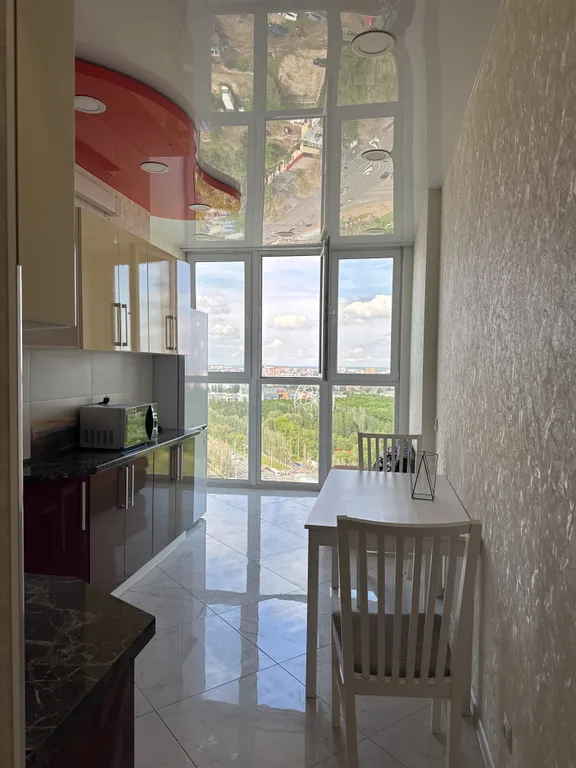 Апартаменты с видом на город с 24 этажа