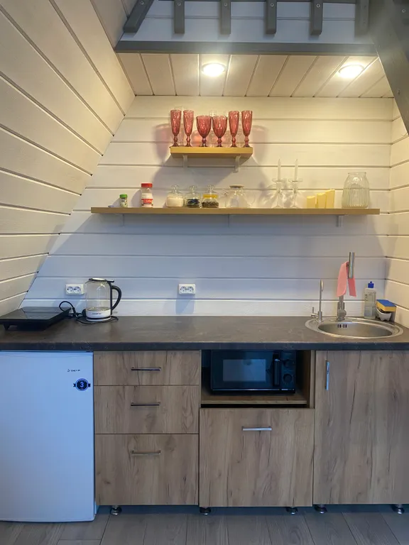 Треугольный дом