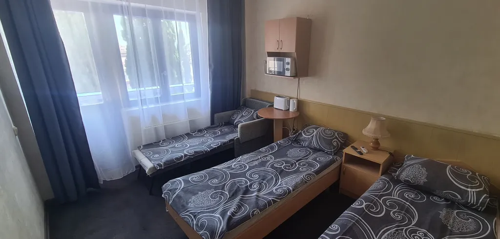 Трёхместный номер рядом с морем и аквапарком