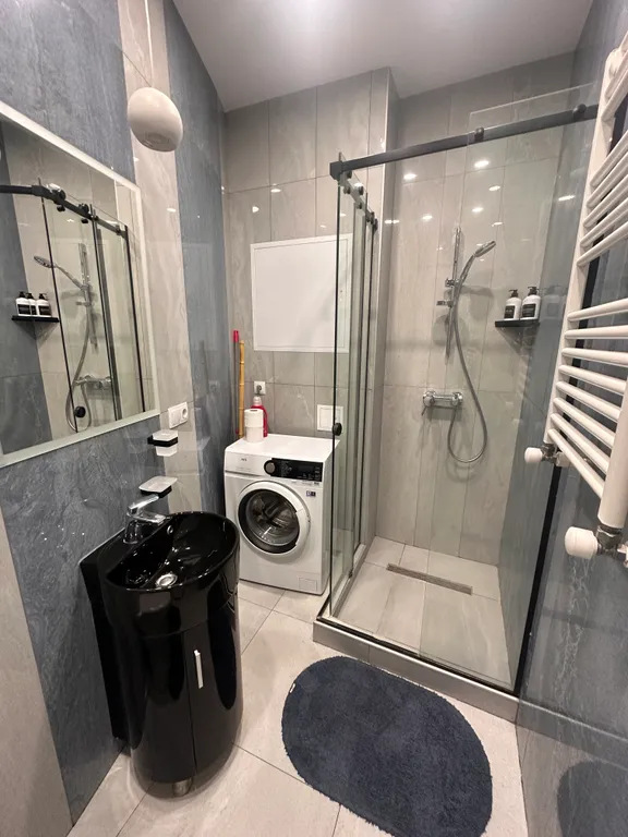 Новые дизайнерские апартаменты в Ваке Axis Towers