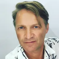 Николай