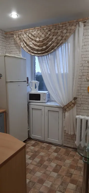 Двушка с видом на ёлочки.