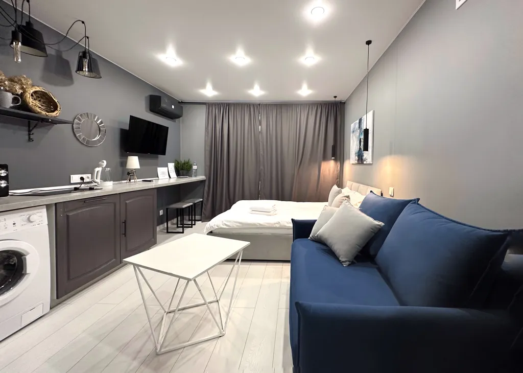 Дизайнерская сканди-студия от Vitamia art в новом ЖК комфорт-класса