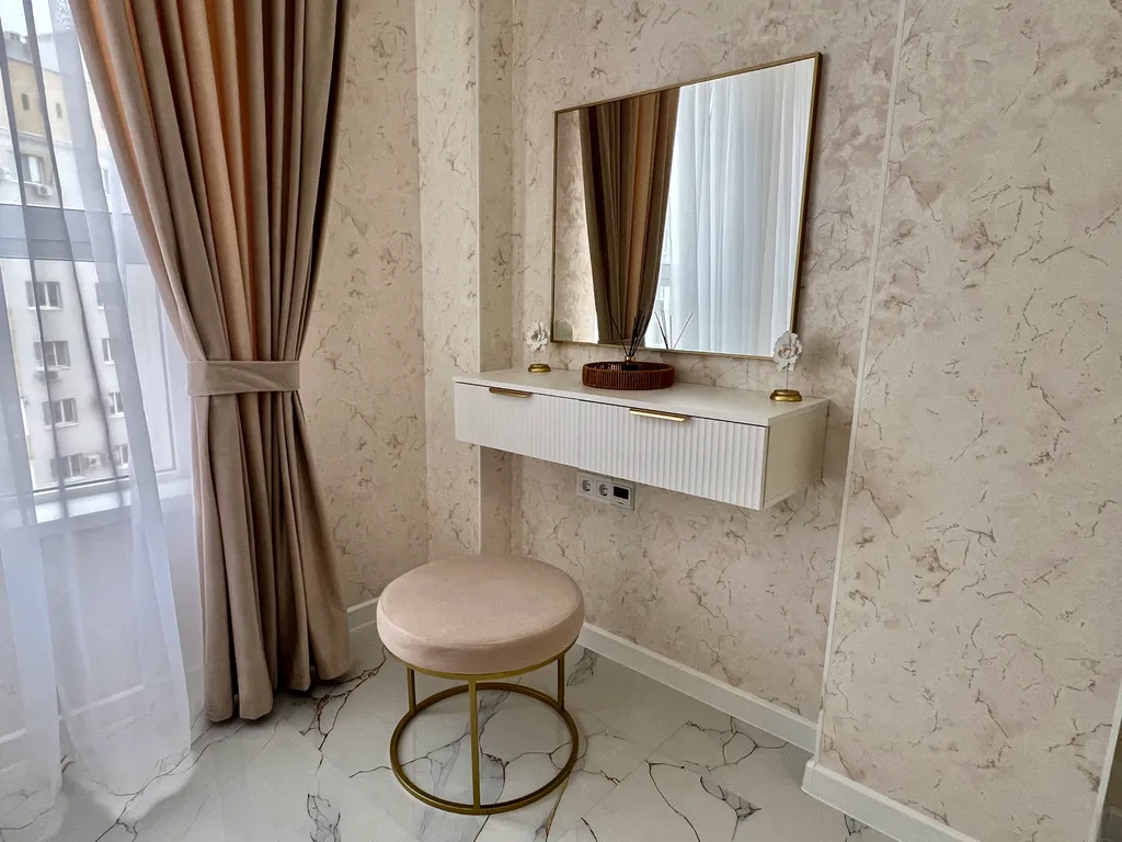 Уютная квартира в элитном доме с дизайнерским ремонтом