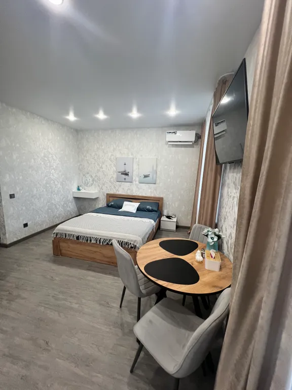 Уютная студия с кофемашиной в центре