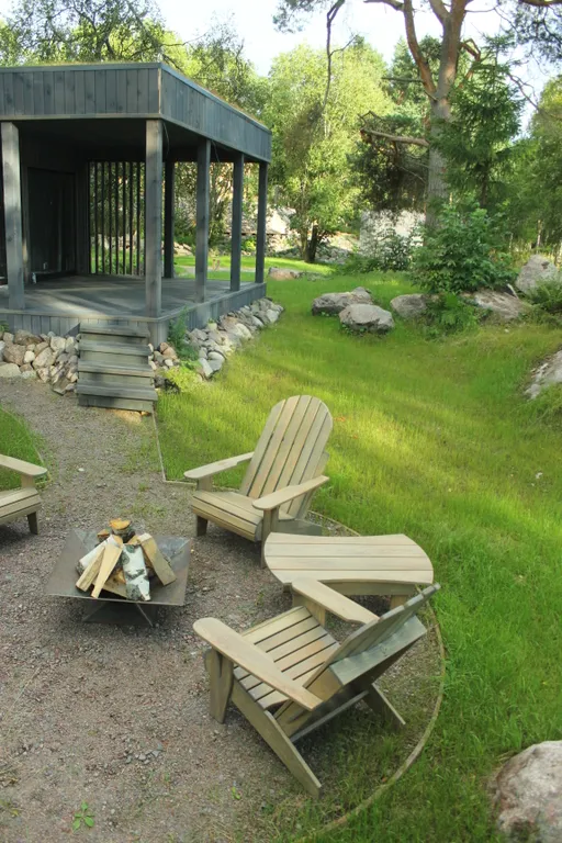 Вилла Nelli с видом на озеро и зоной барбекю среди каменной россыпи