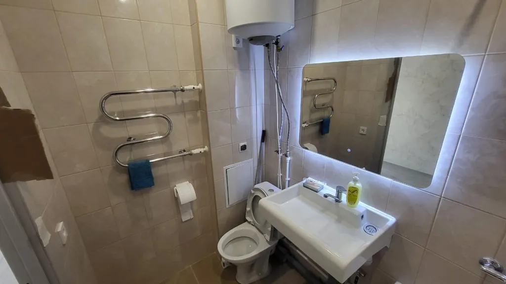 Уютная квартира в новом доме с панорамными окнами