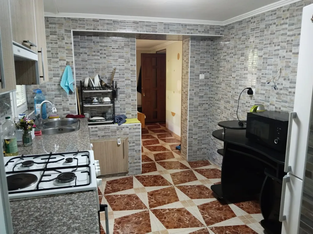 Апартаменты с большой кухней и выходом во двор