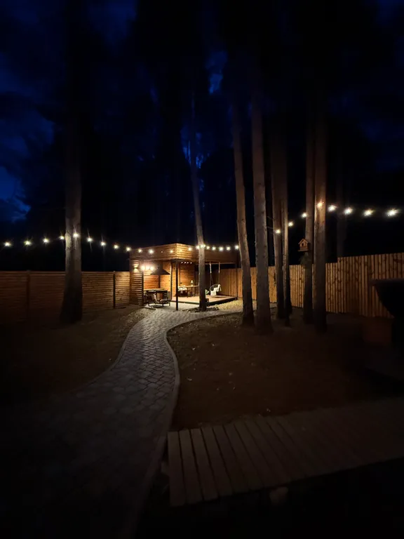 Дом А-фрейм с камином и баней с видом на лес