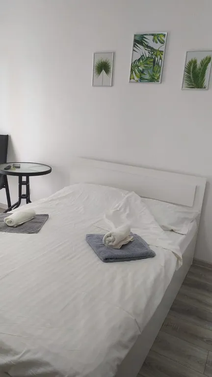 Апартаменты с большой кроватью в Холидей Хаус