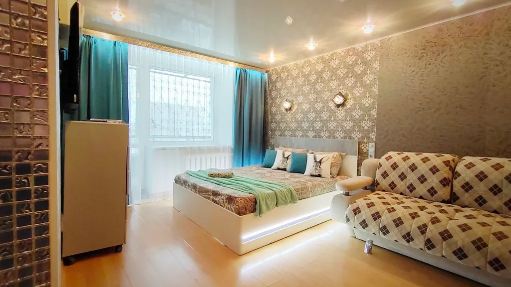 Уютная квартира у набережной и колеса обозрения