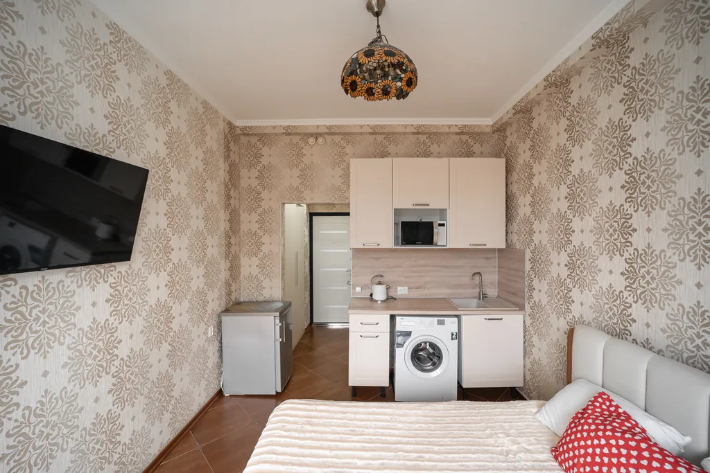 Очень теплый апартамент с открытым балконом, кухней, парковкой