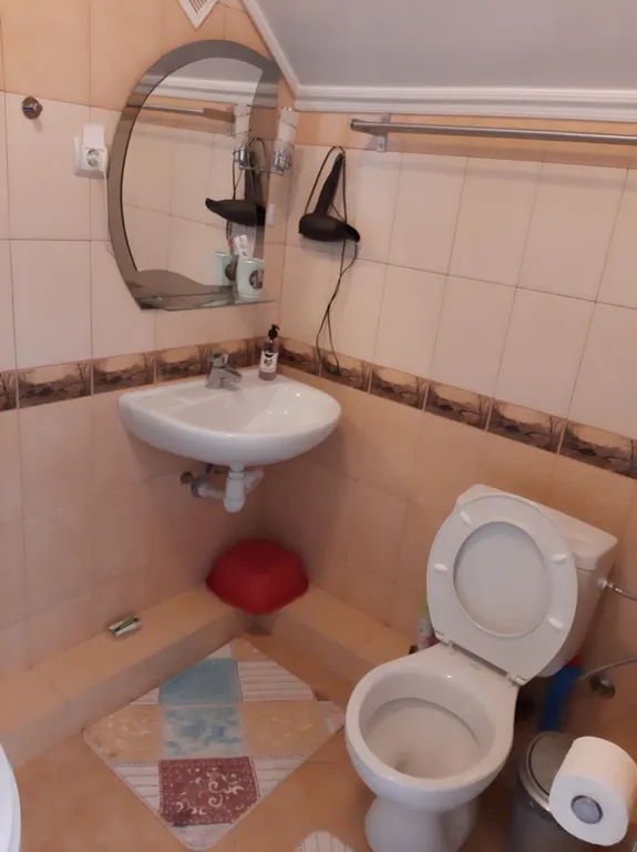 Уютная комната в трёхэтажной квартире в западной части города