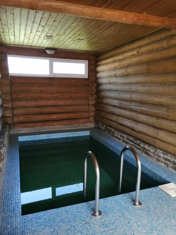 Жилой деревянный двухэтажный дом