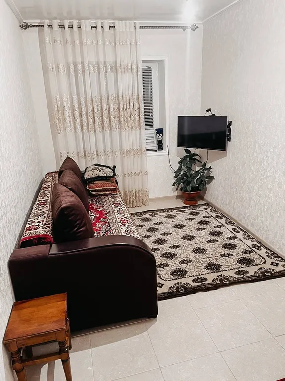 Уютная комната в двухэтажном доме