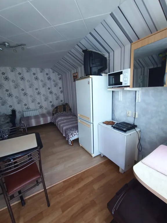 Коттедж Коттедж Уютный номер-студия со всеми удобствами на втором этаже с террасой — Ейск