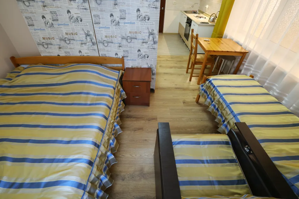 Квартира Квартира Трехместный номер с доп. местом без балкона с видом во двор с кухней — Лазаревское