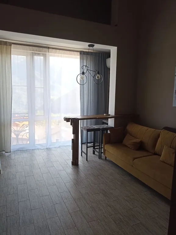 Двухуровневая студия с видом на горы