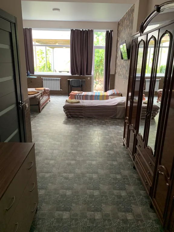 Пятиместный люкс с кухней и своей верандой