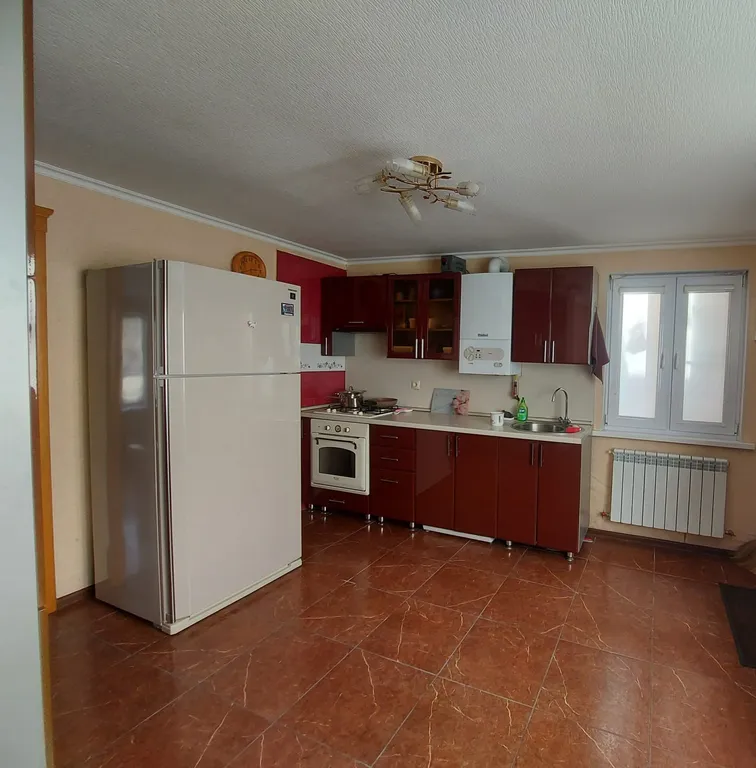 Дом в центре города на набережной реки Терек