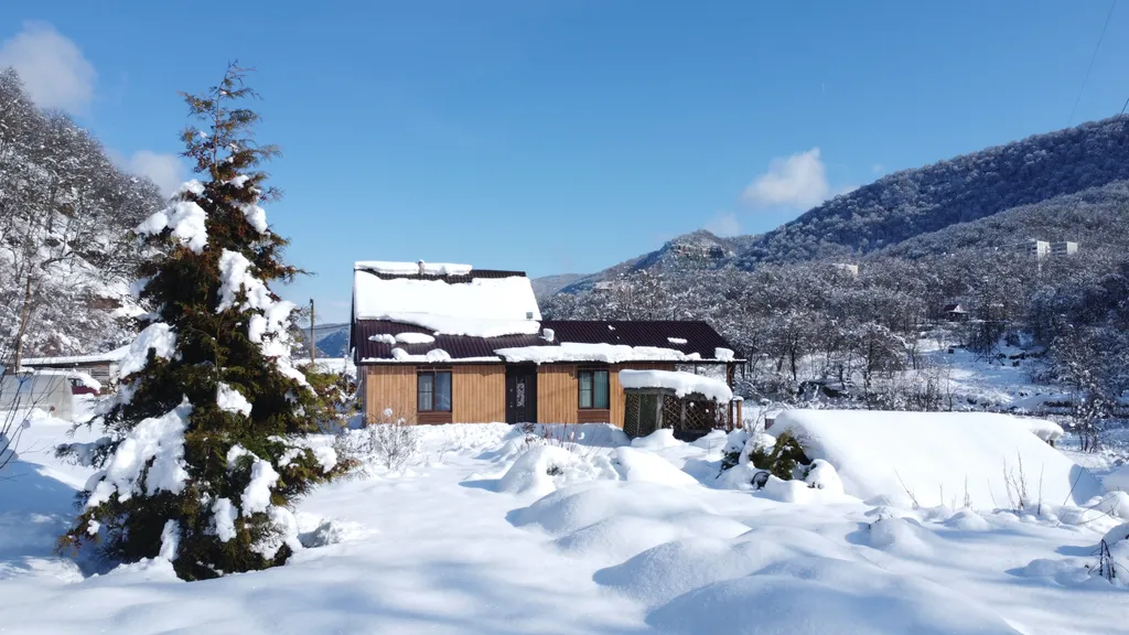 Коттедж Коттедж "Буковель" с терассой и видом на горы. — Архыз