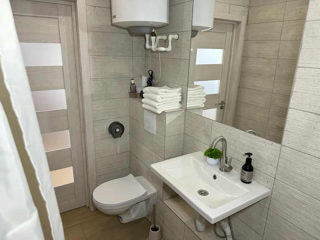 Двухэтажные апартаменты с балконом Столица 2313