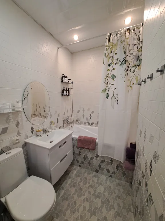 Светлая однушка с кроватью и смарт ТВ