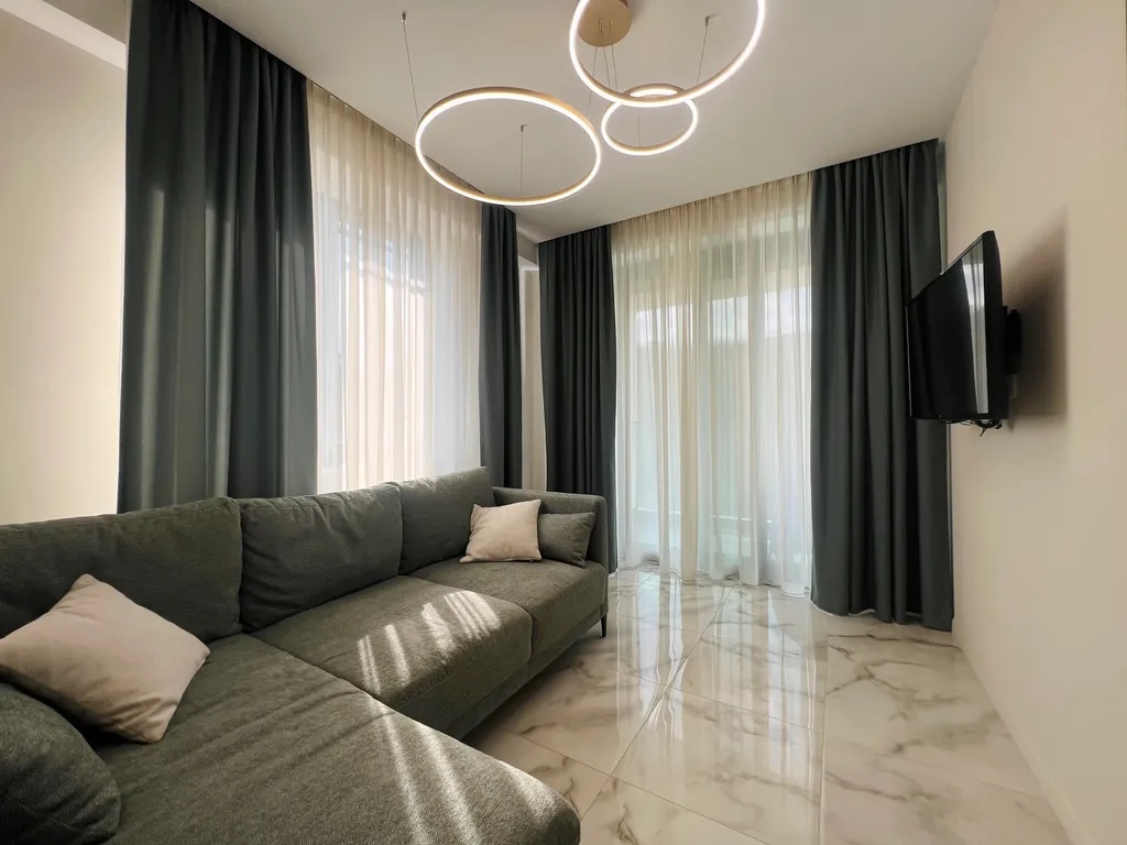 Апартаменты в вечнозелёном парке у моря