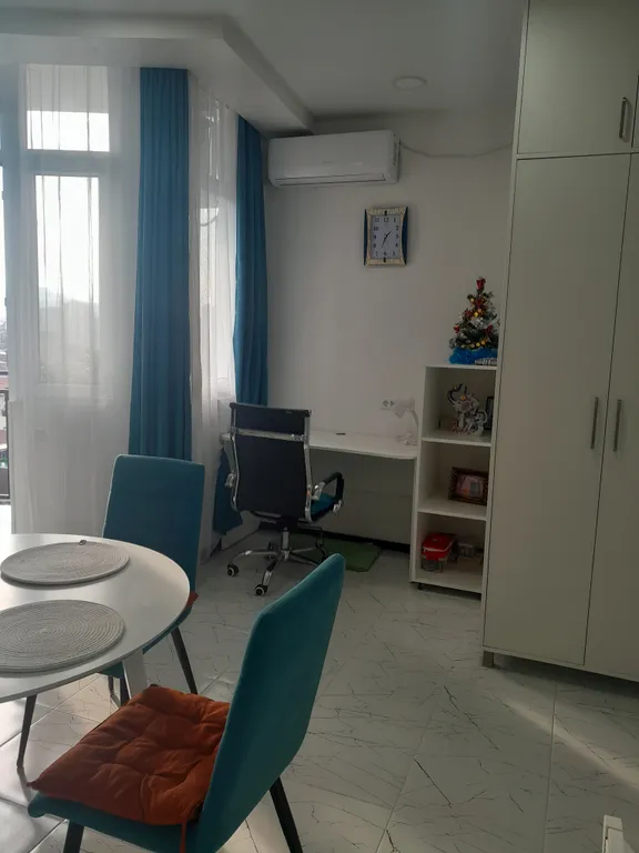 Уютная студия в центре с видом на горы