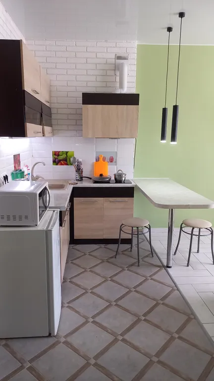 Уютная, светлая квартира ,кухня-студия,спальная.