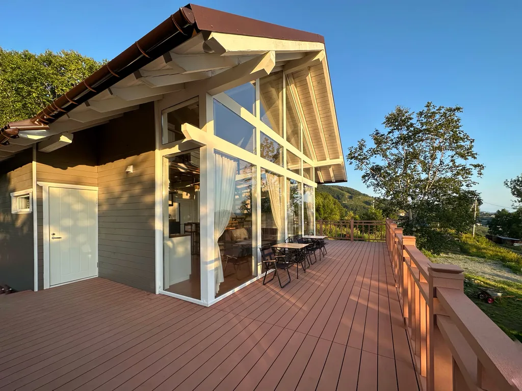 Шале с видом на бухту и вулкан