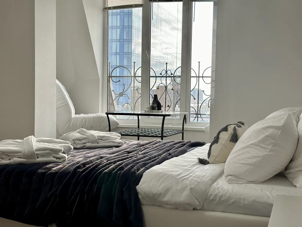 Панорамные апартаменты в центре города c видом на отель Мarriott