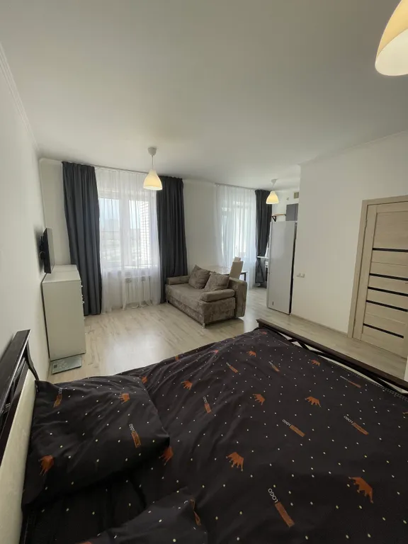 Квартира Уютная студия в центре микрорайоне Прибрежный — аренда посуточно в Омск