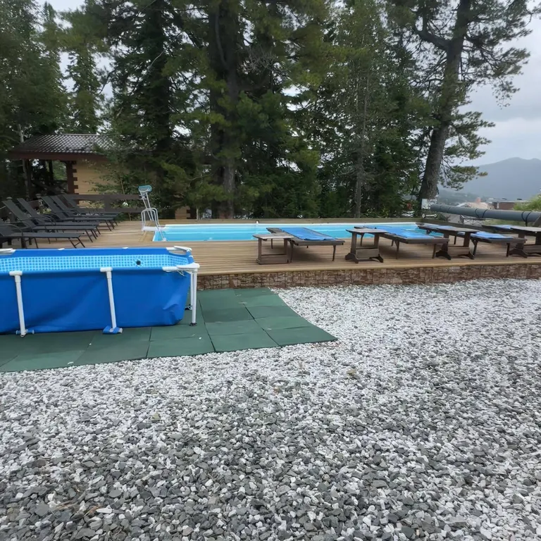 Двухэтажный дом на горе у подъёмника