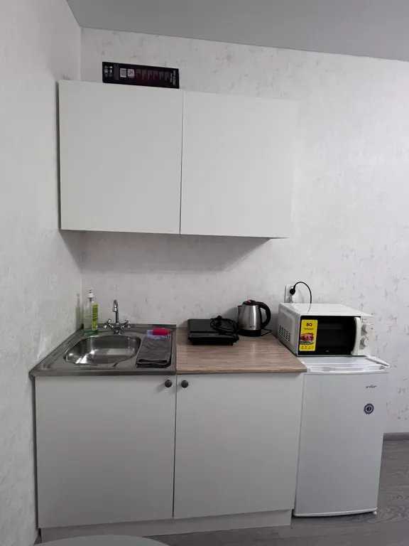 Уютная студия на высоком этаже