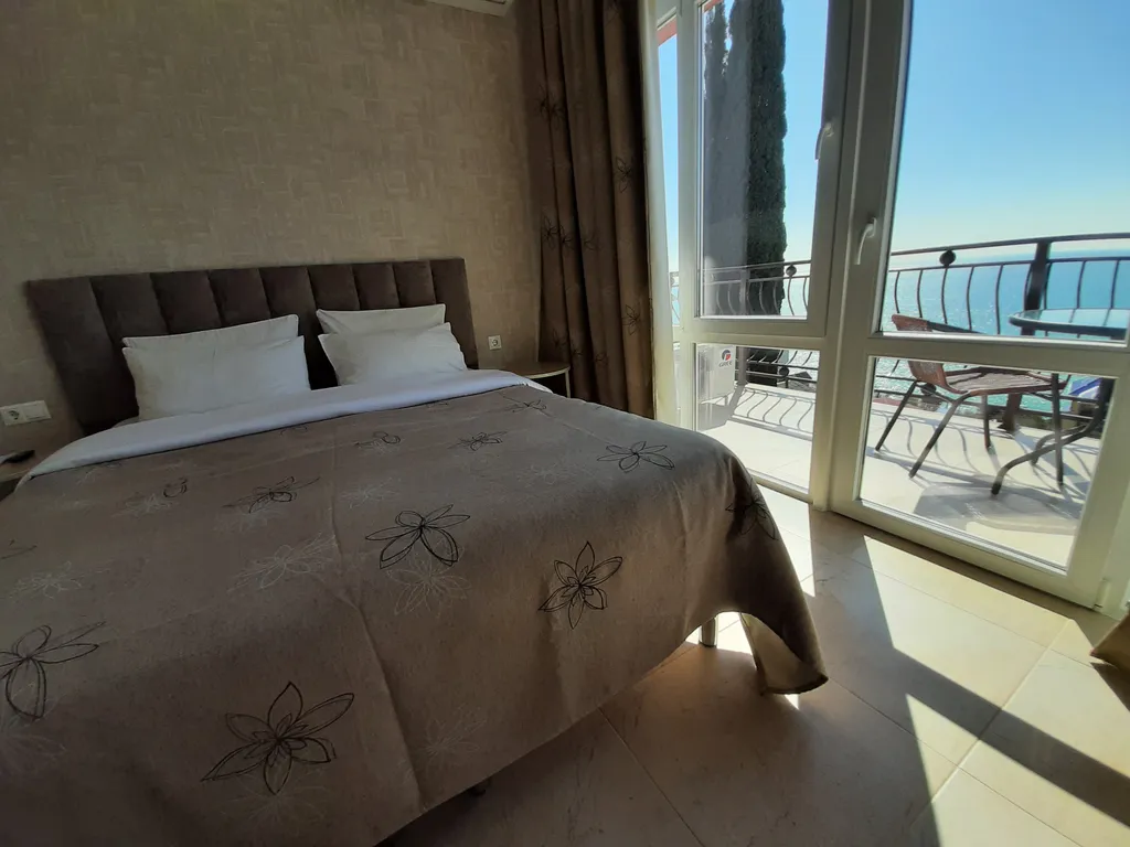 Люкс с балконом и панорамным видом на море