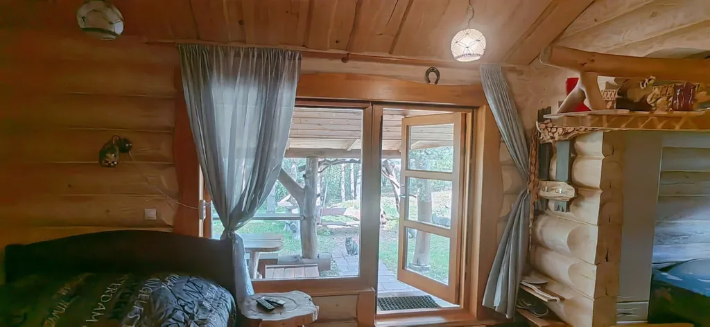 Уютный дом у озера Ельно