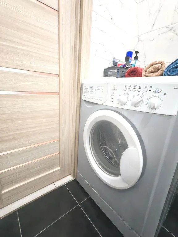 Дом в городе с зоной барбекю