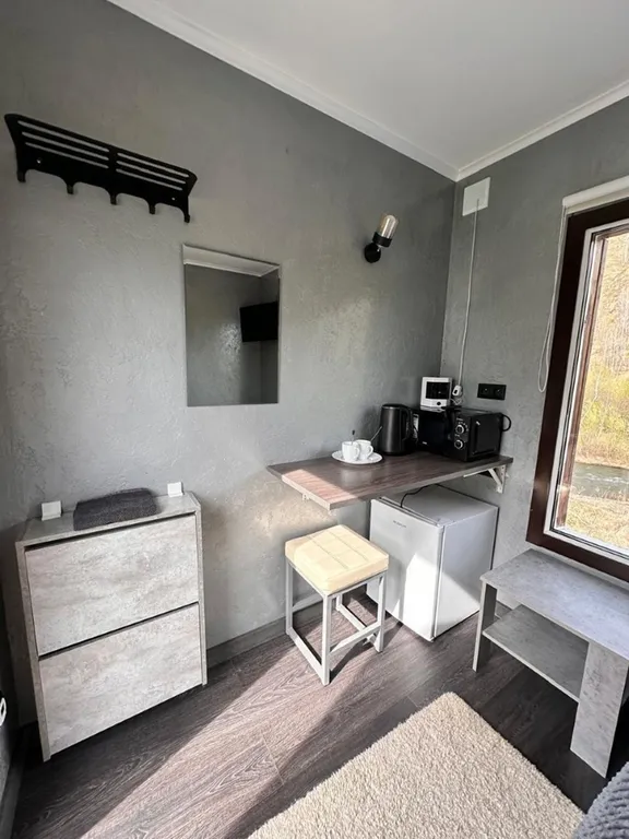 Номер с панорамным видом на горы и речку.