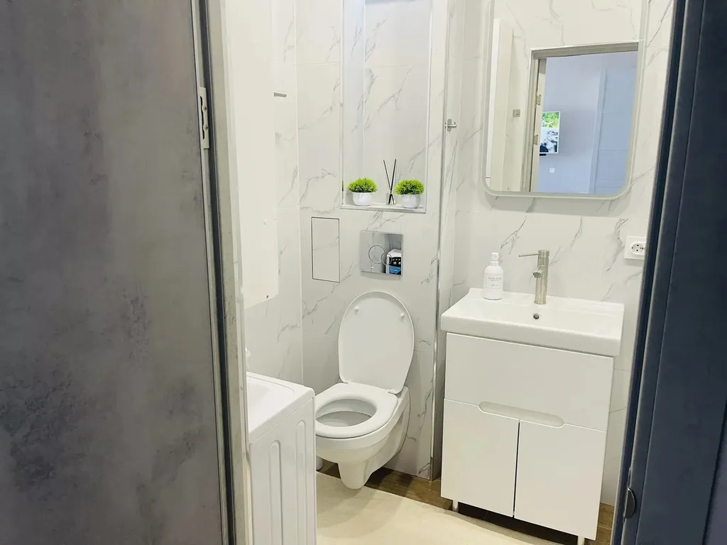 Уютная квартира в тихом районе с развитой инфраструктурой.