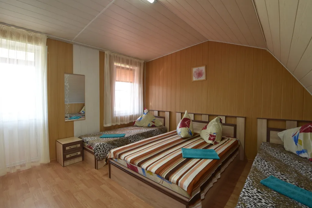 Квартира Двухуровневый номер с кухней и видом на море — аренда посуточно в Голубицкая