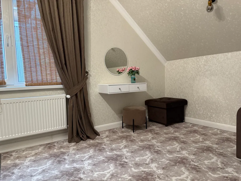 Malkar house с видом на гору Чегет