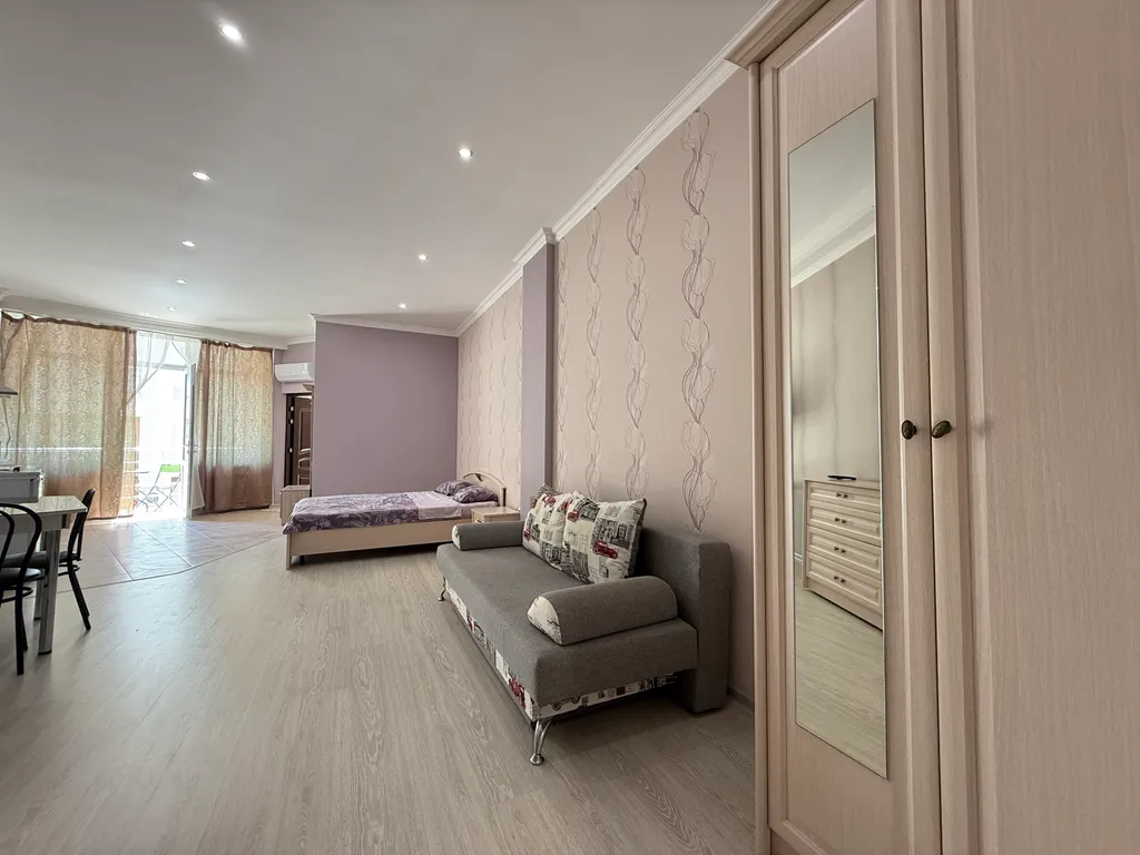 Квартира у пляжа с балконом и зоной барбекю