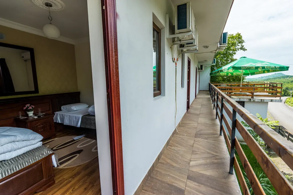 Двухместный Делюкс с 1 кроватью или 2 отдельными кроватями и балконом