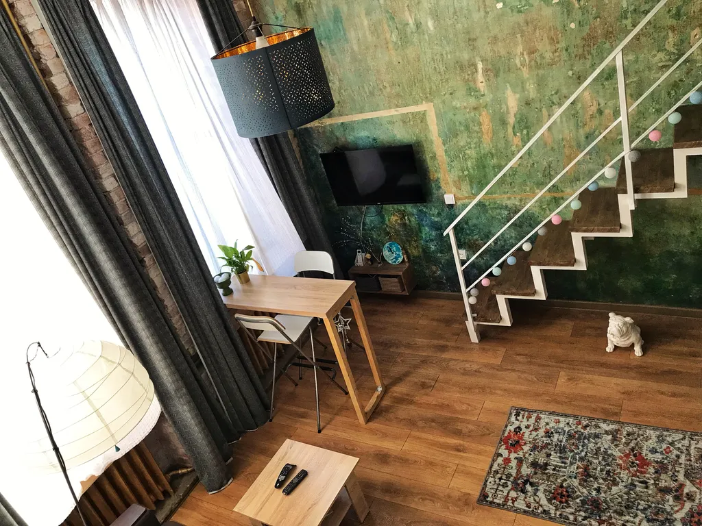 Buddha Room - двухуровневые апартаменты с качелями