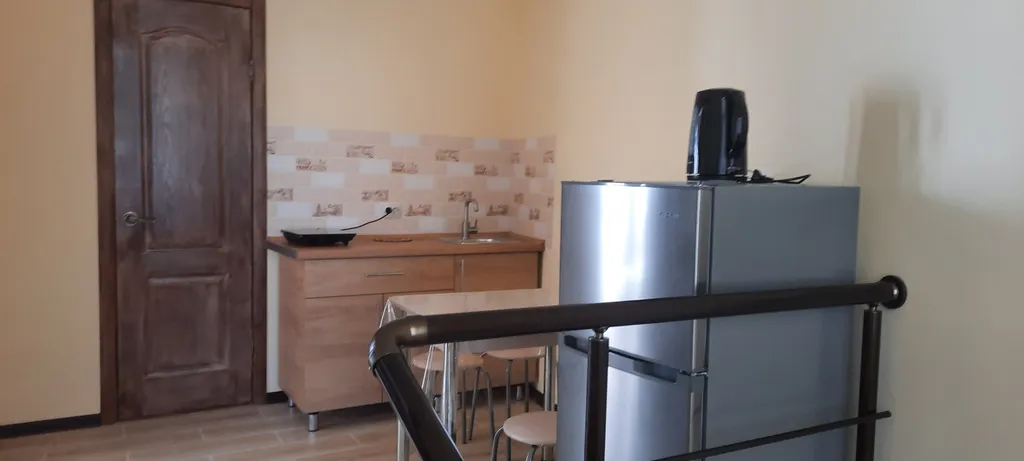 Двухкомнатный номер с кухней в коттедже