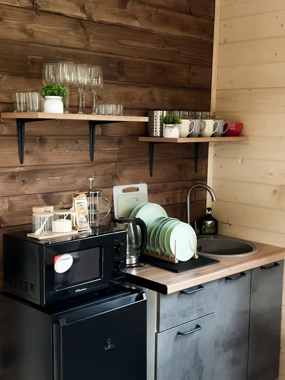 Дом в лесу с сауной в стиле барнхаус